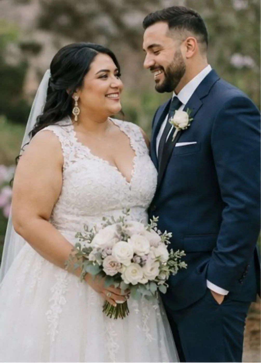 Couple portrait with bouquet
