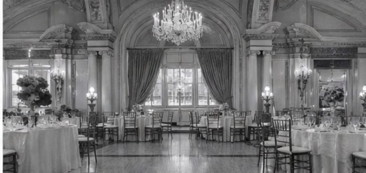 gold chandelier ballroom set for a wedding reception