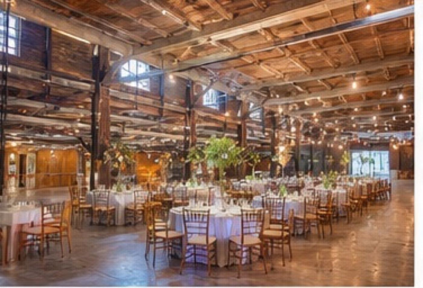 Timber loft wedding venue with string lights